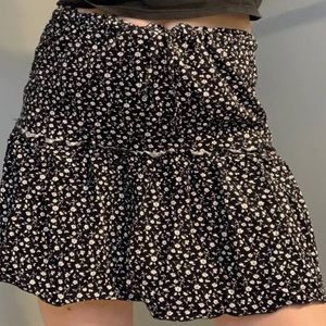 Brandy Melville skirt, black with flowers, one size fits all / medium